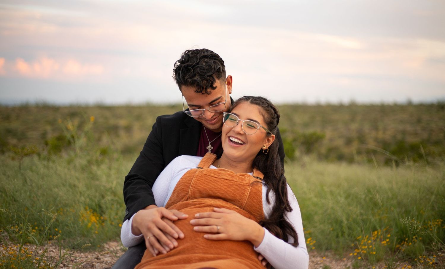 laughing couple maternity photo