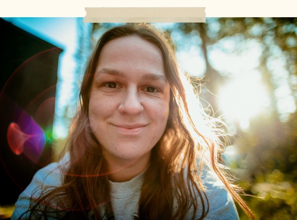 queer nonbinary white photographer and birth worker kimberly marie kimble self portrait sunburst portland oregon