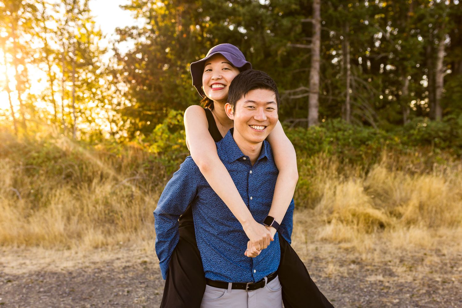 Brother giving sister a piggy back in Issaquah