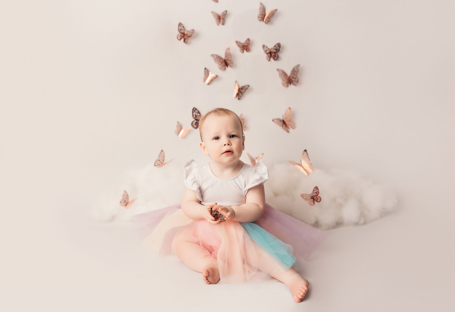 Tulsa baby photographer baby girl 1 year pictures butterfly cake smash