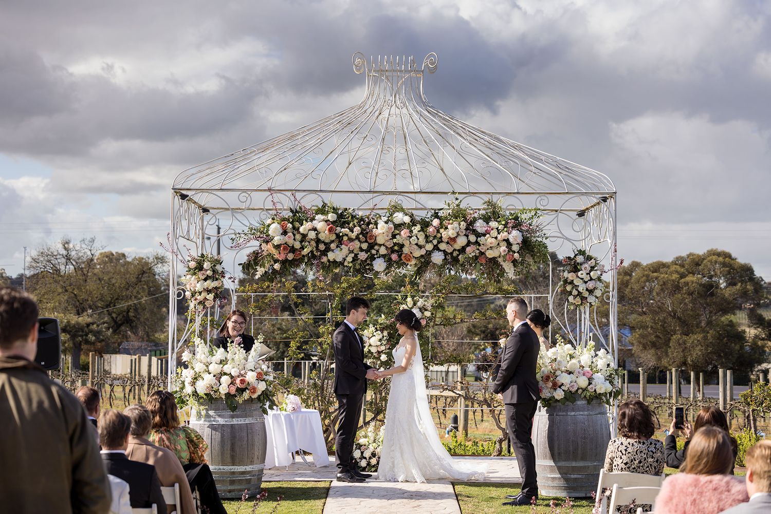 Bride and Groom exchanging their wedding vows at De Bortoli Rutherglen Estate captured by Jason Robins Photography