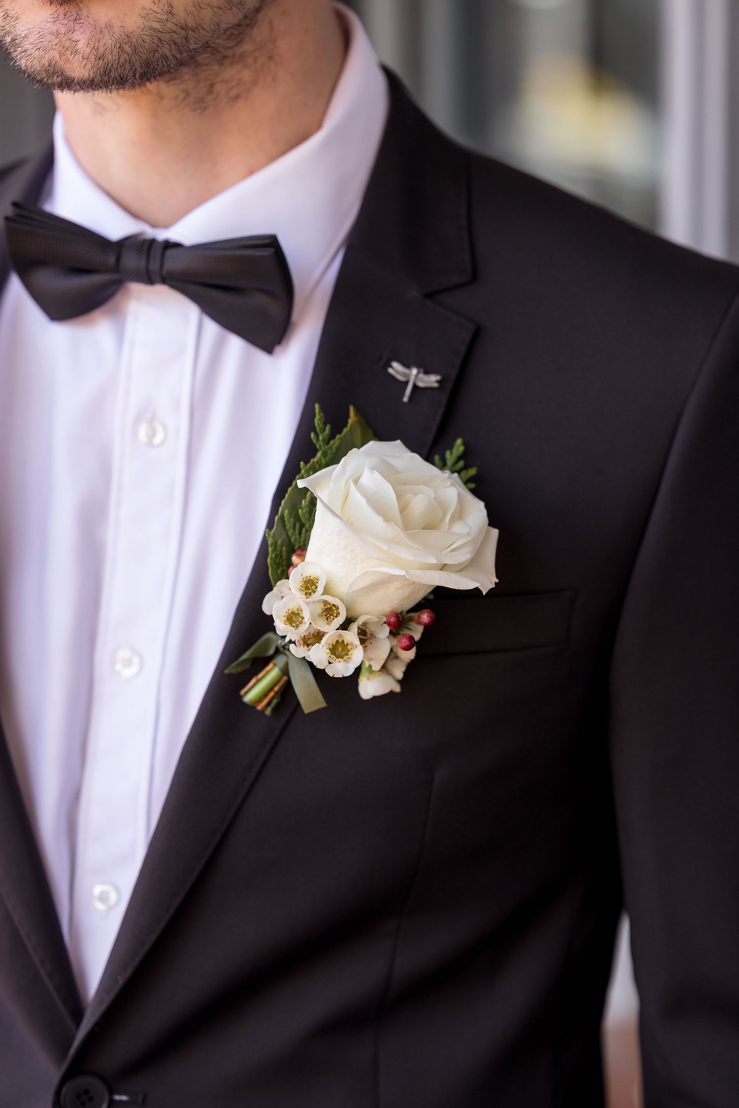 The grooms button hole flower at De Bortoli Rutherglen Estate before his wedding ceremony captured by Jason Robins