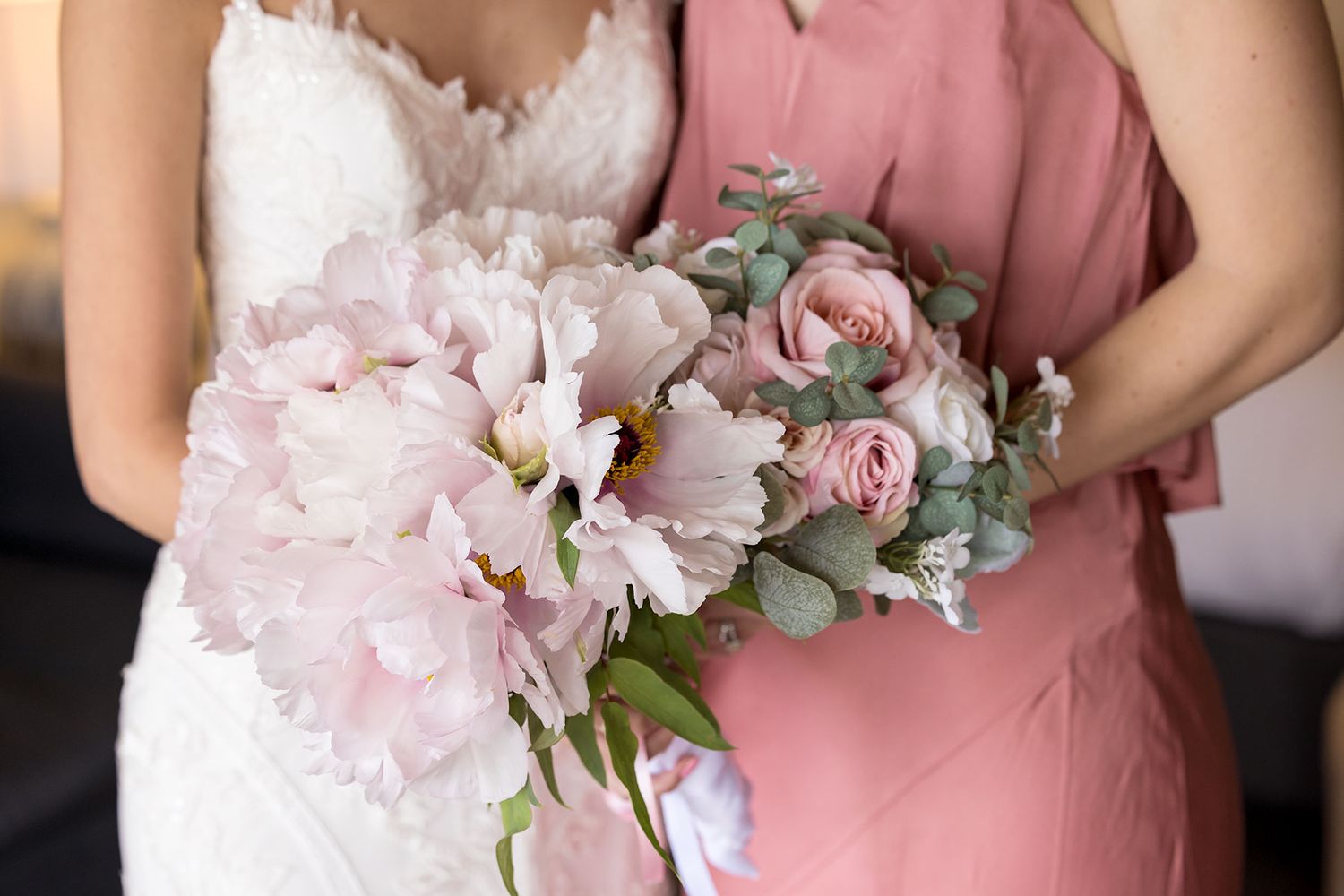 Bride with her Bridesmaid and their wedding flowers in the accommodation at De Bortoli Rutherglen Estate