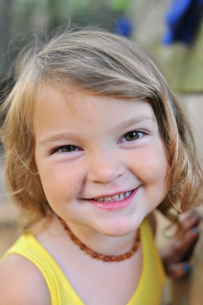Preschool girl portrait in yellow
