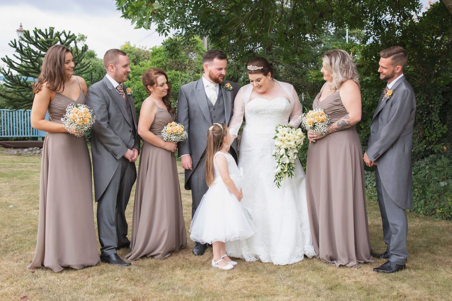 Metropolitan Bushey bride and groom with their bridesmaids and groomsmen