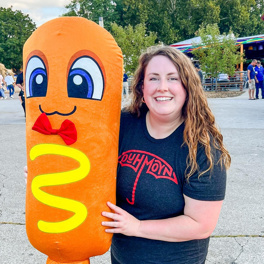 Large inflatable orange duck mascot displayed at an outdoor event.