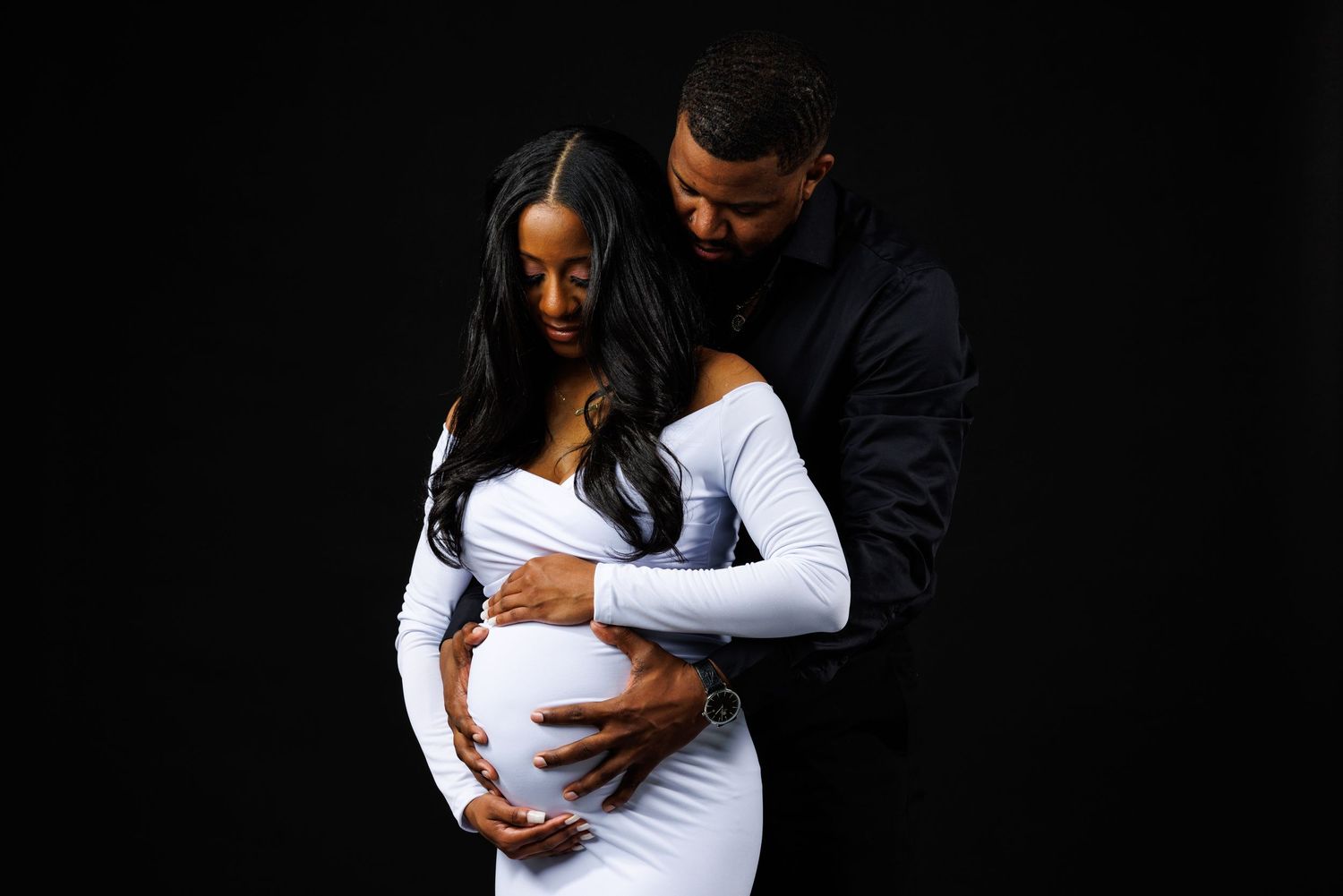Black couple maternity portrait in 360ism Studio