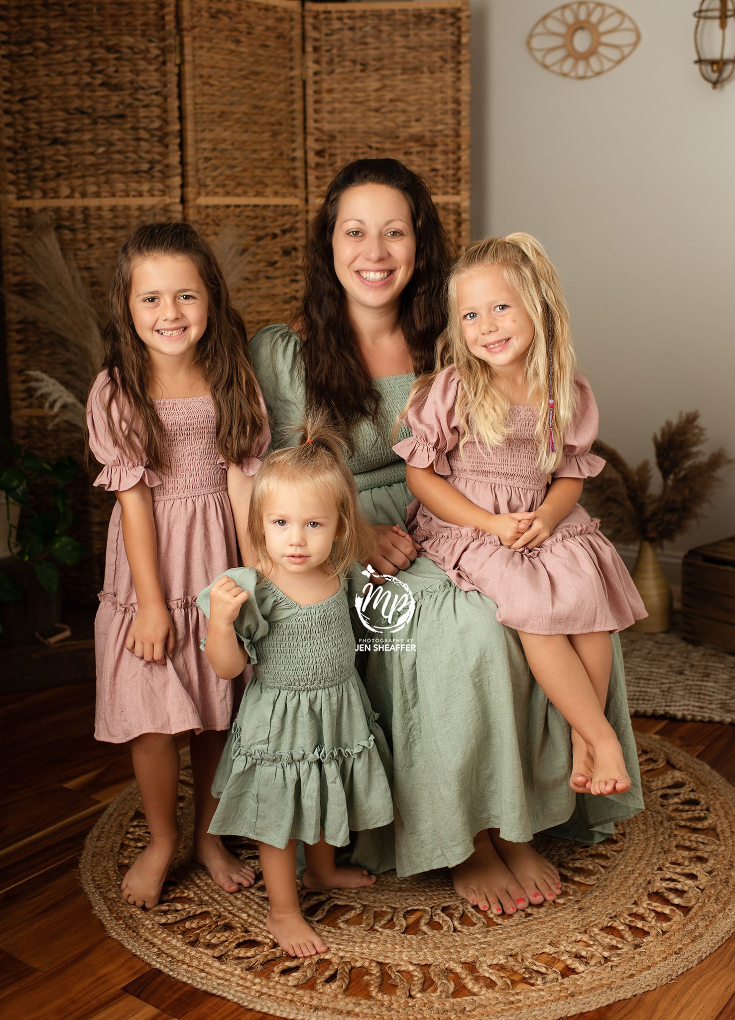 mom and daughters for newborn session with dresses from Ivy City Co available for all moms and girls in our studio