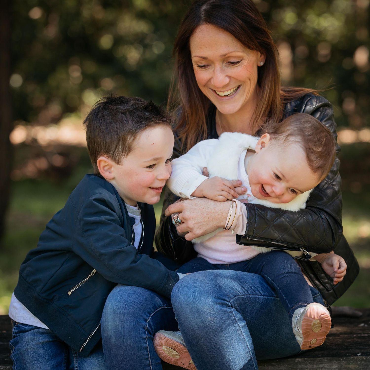 Mum with two kids playing