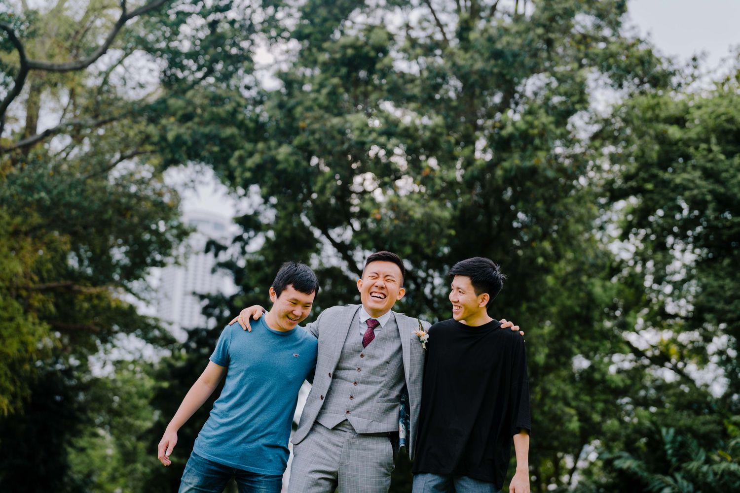 groomsmen and groom at fort canning park singapore