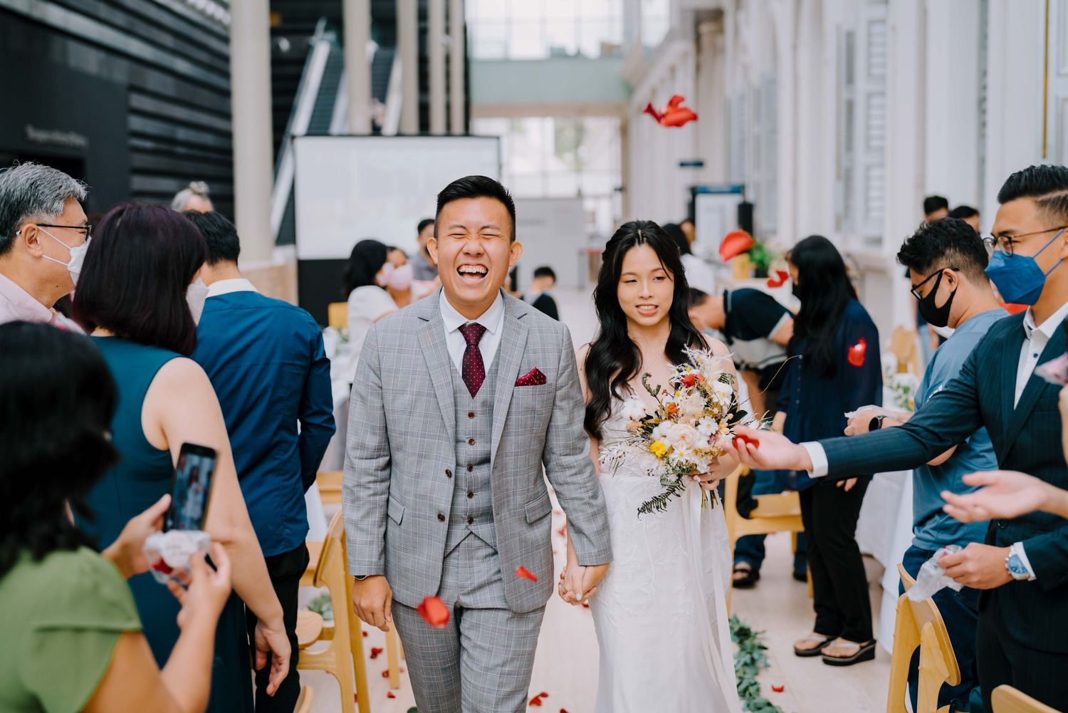 emotional and candid wedding photography at singapore national museum by a documentary-style wedding photographer