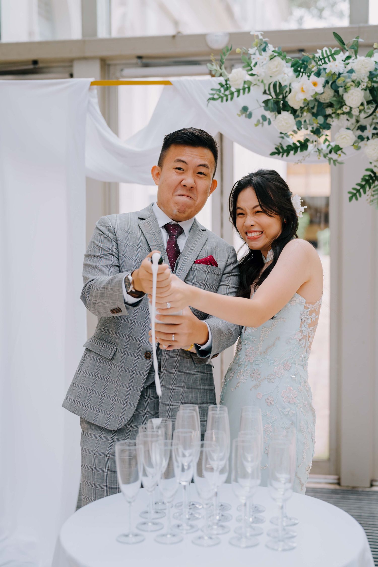 champagne pouring at national museum of singapore wedding