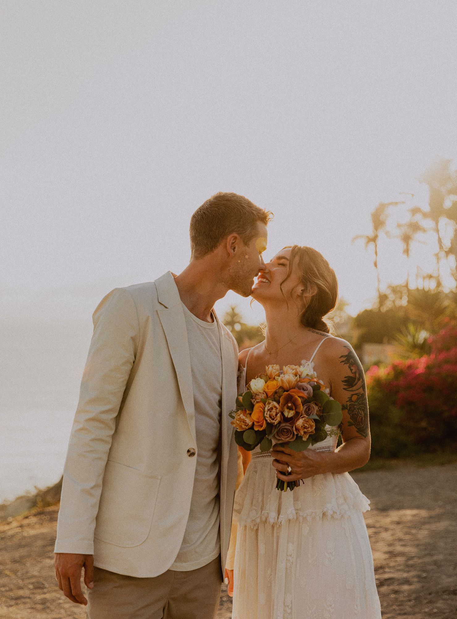 Bride and groom couple's portraits after a Palos Verdes cliffs wedding overlooking the ocean