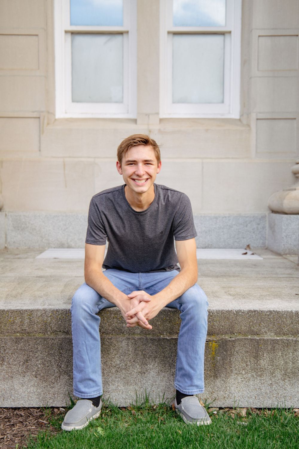 Series of casual portraits on concrete steps with building facade background.