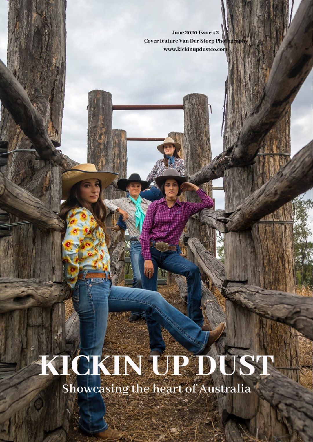 Three people in western wear pose on wooden fence structures against cloudy sky.