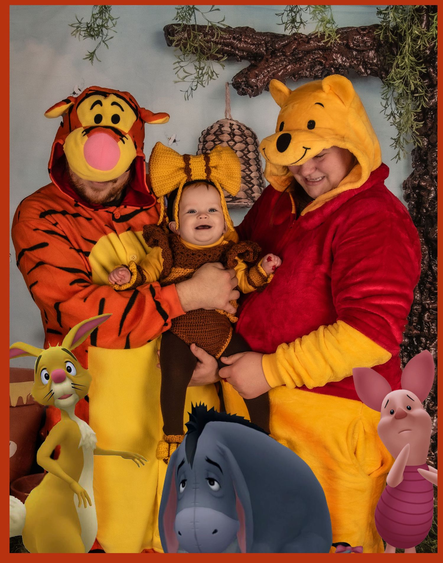Winnie the Pooh themed family photo with plush character decorations.