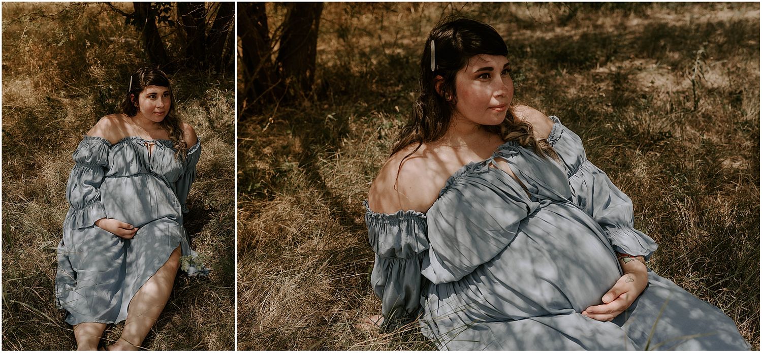 Artistic maternity photos showing an expectant mother in a grey dress against a rustic outdoor backdrop.
