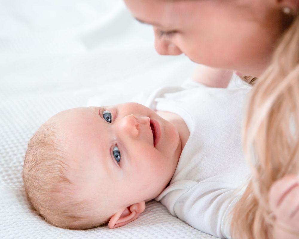 baby girl with mother
