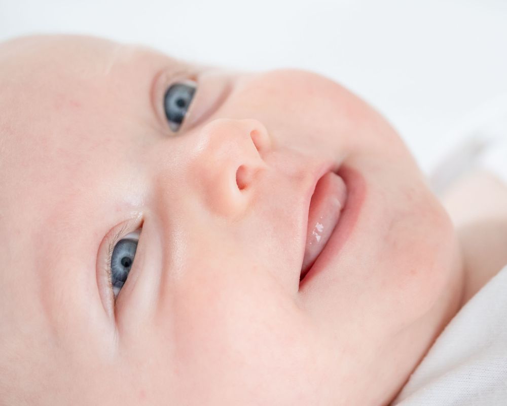 close up of baby smiling