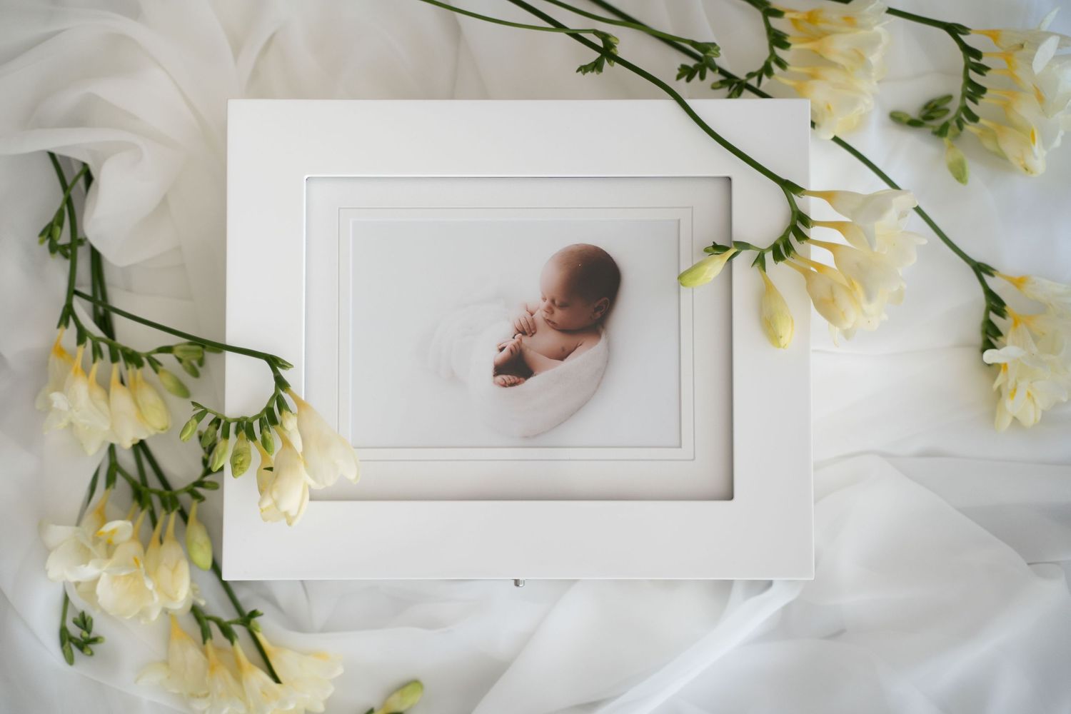 Hochwertige Fotobox weiss mit Foto von Baby