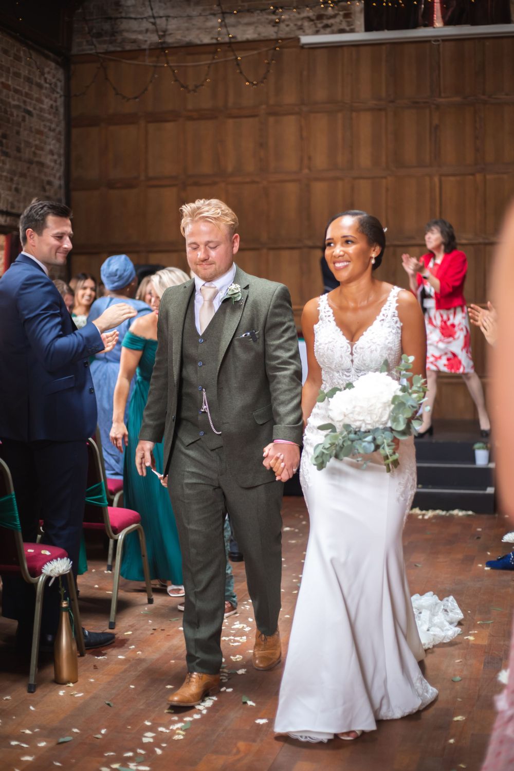 bride and groom walking down the aisle