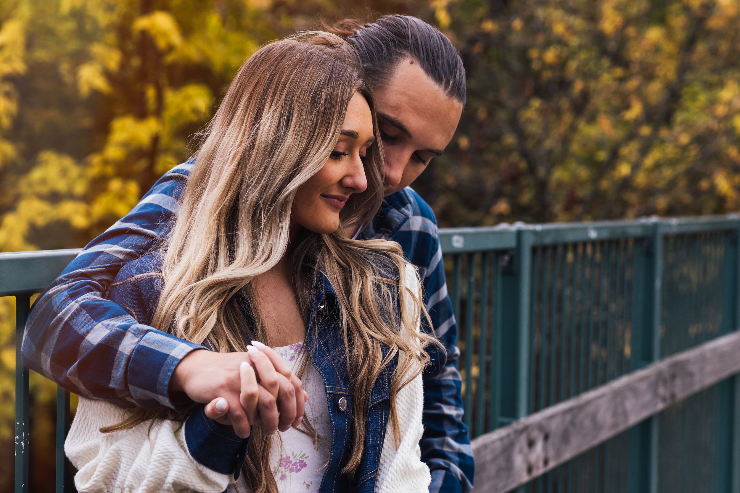 young couple on bridge