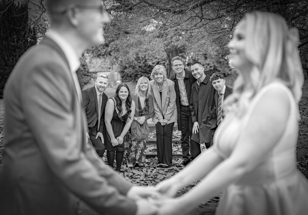 Wedding celebration sequence showing joyful moments with guests outdoors.
