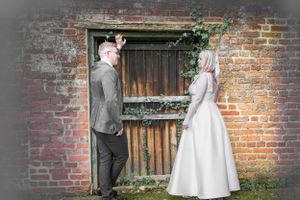 A series of vintage brick wall portraits showcasing a romantic wedding photoshoot.