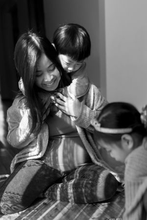Motherhood pregnancy and spontaneous hugs