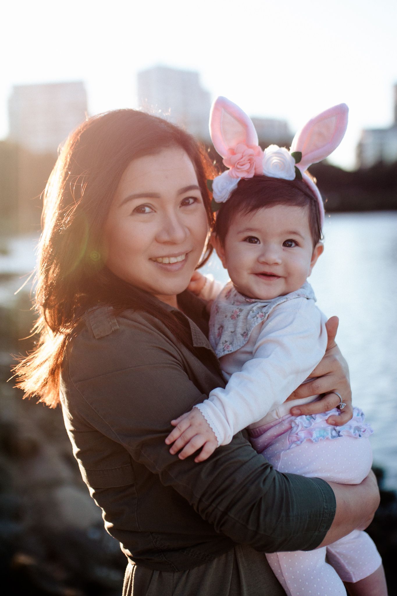 Mother and daughter backlit