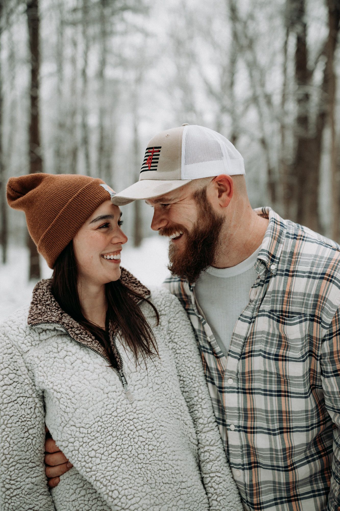 couple-smiling-engagement-session-oak-openings