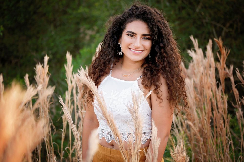 C. E. King High School senior in a field in Kingwood, Texas.