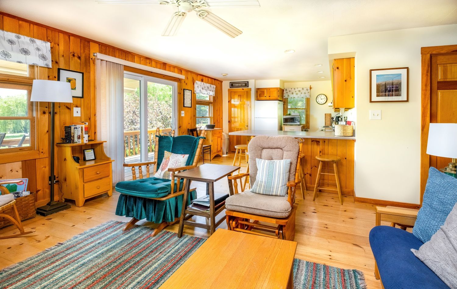 Alternative angle of a living room and kitchen at an Air B and B Property in Jefferson, Maine.