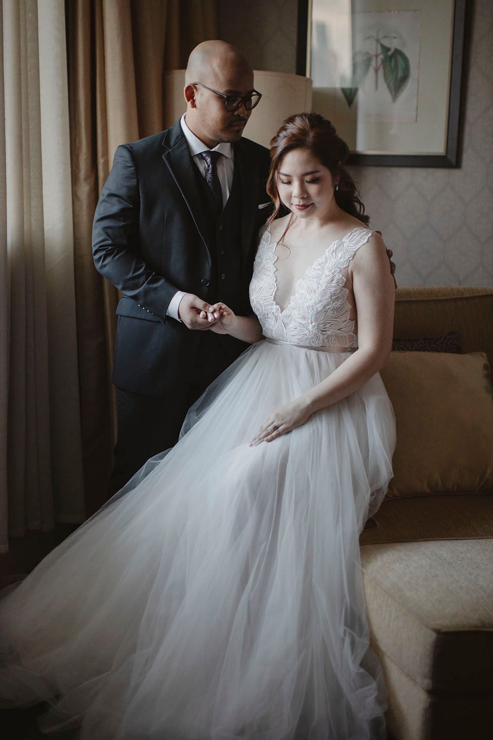 man holding her wife in their wedding day in Majestic Kuala Lumpur