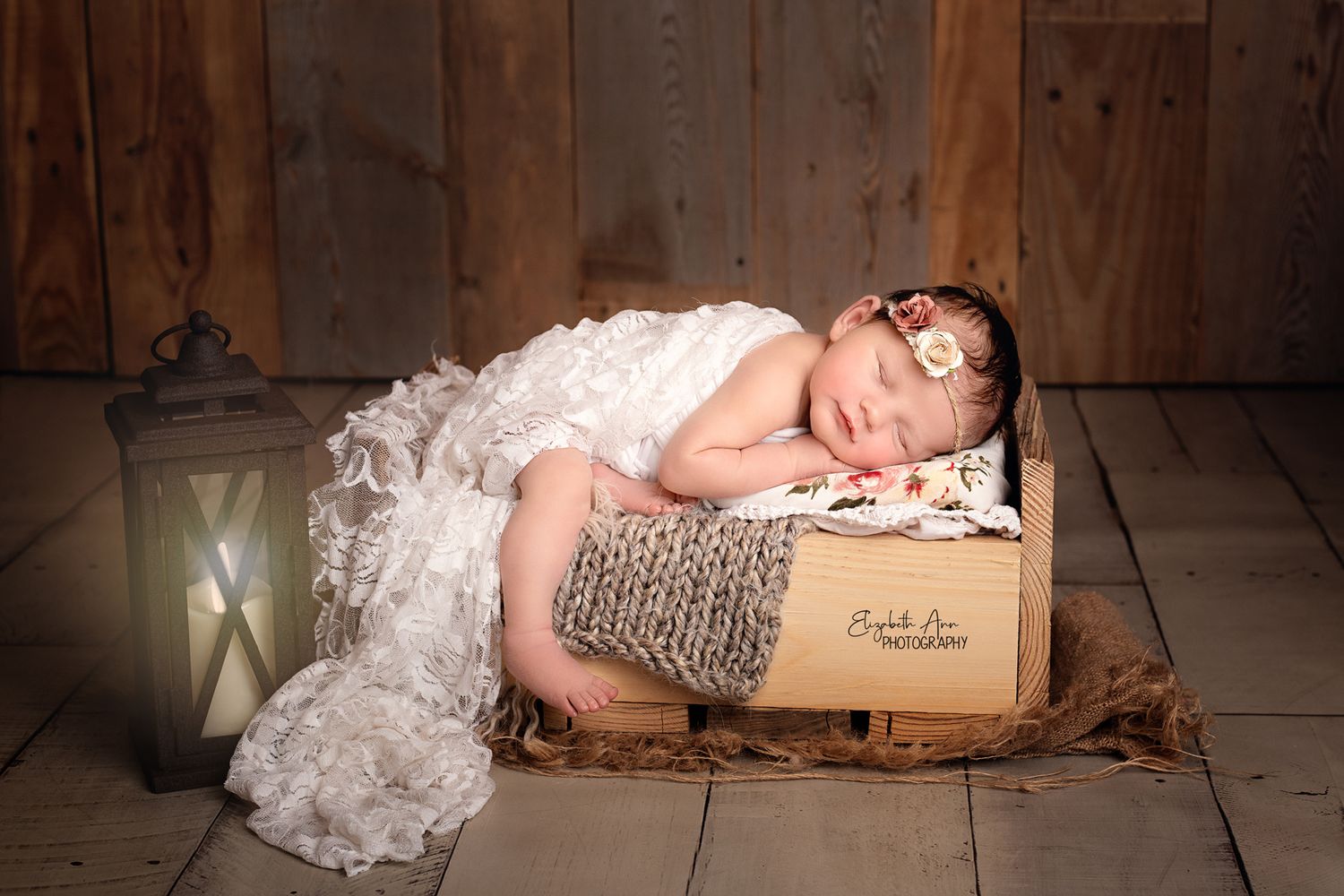 Newborn baby girl sleeping on a wooden bed, burlap, floral, lace, rustic, lantern; Elizabeth Ann Photography Wisconsin