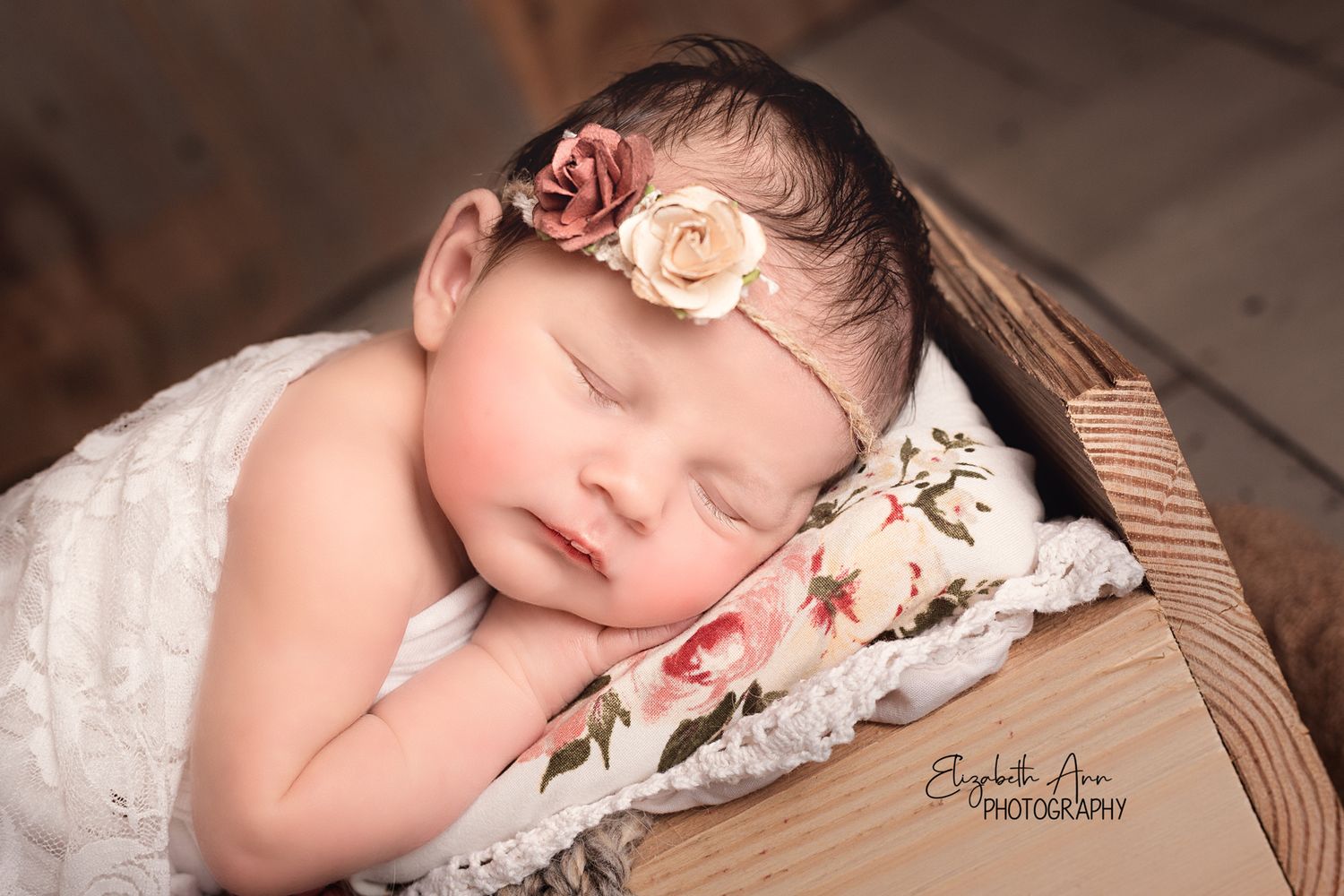 Newborn baby girl sleeping on a wooden bed, burlap, floral, lace, rustic; Elizabeth Ann Photography Wisconsin