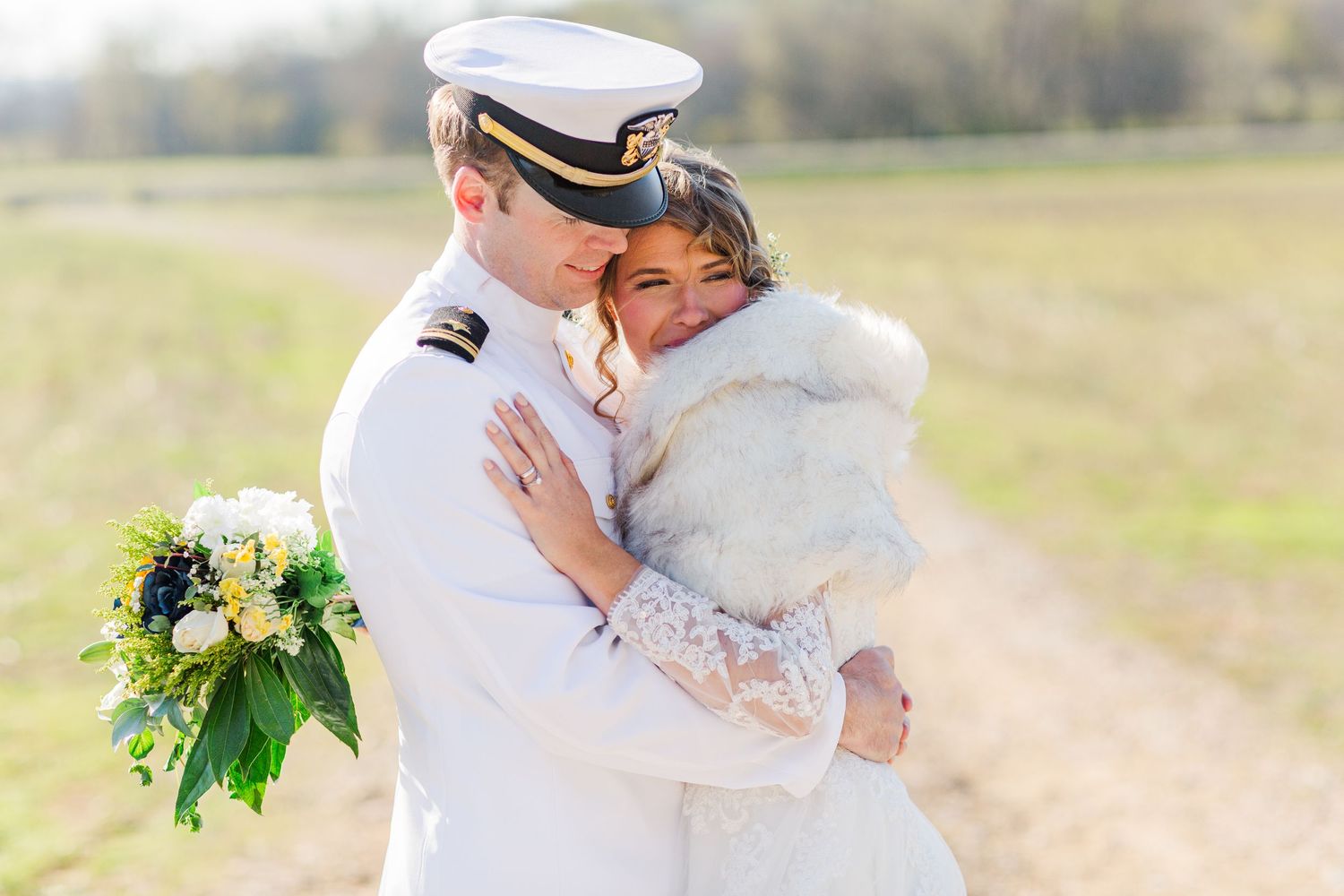 Bride & Groom in field at The Barn At Haywood Creek