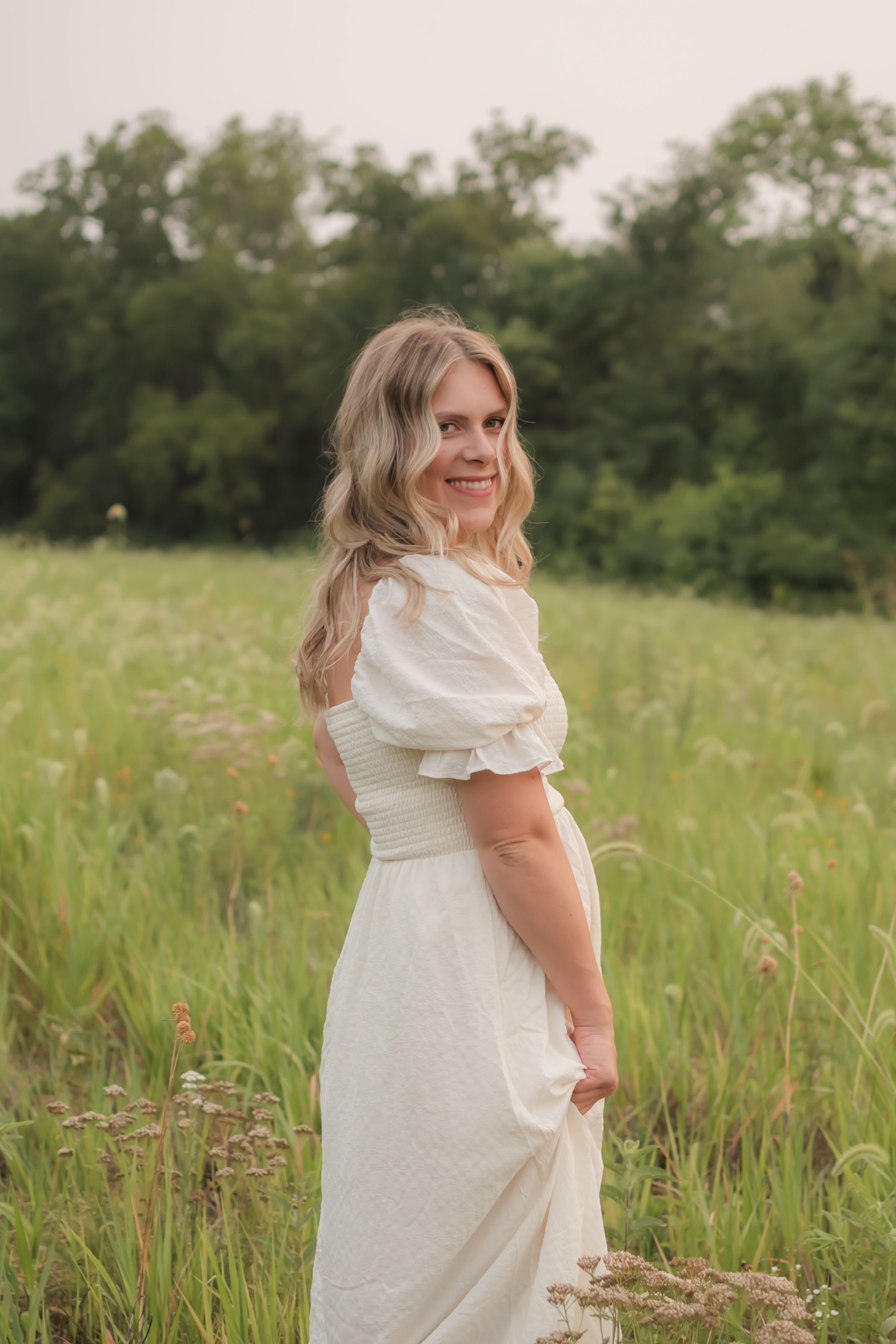 Family photos in a field of wildflowers in Columbia Missouri photographer