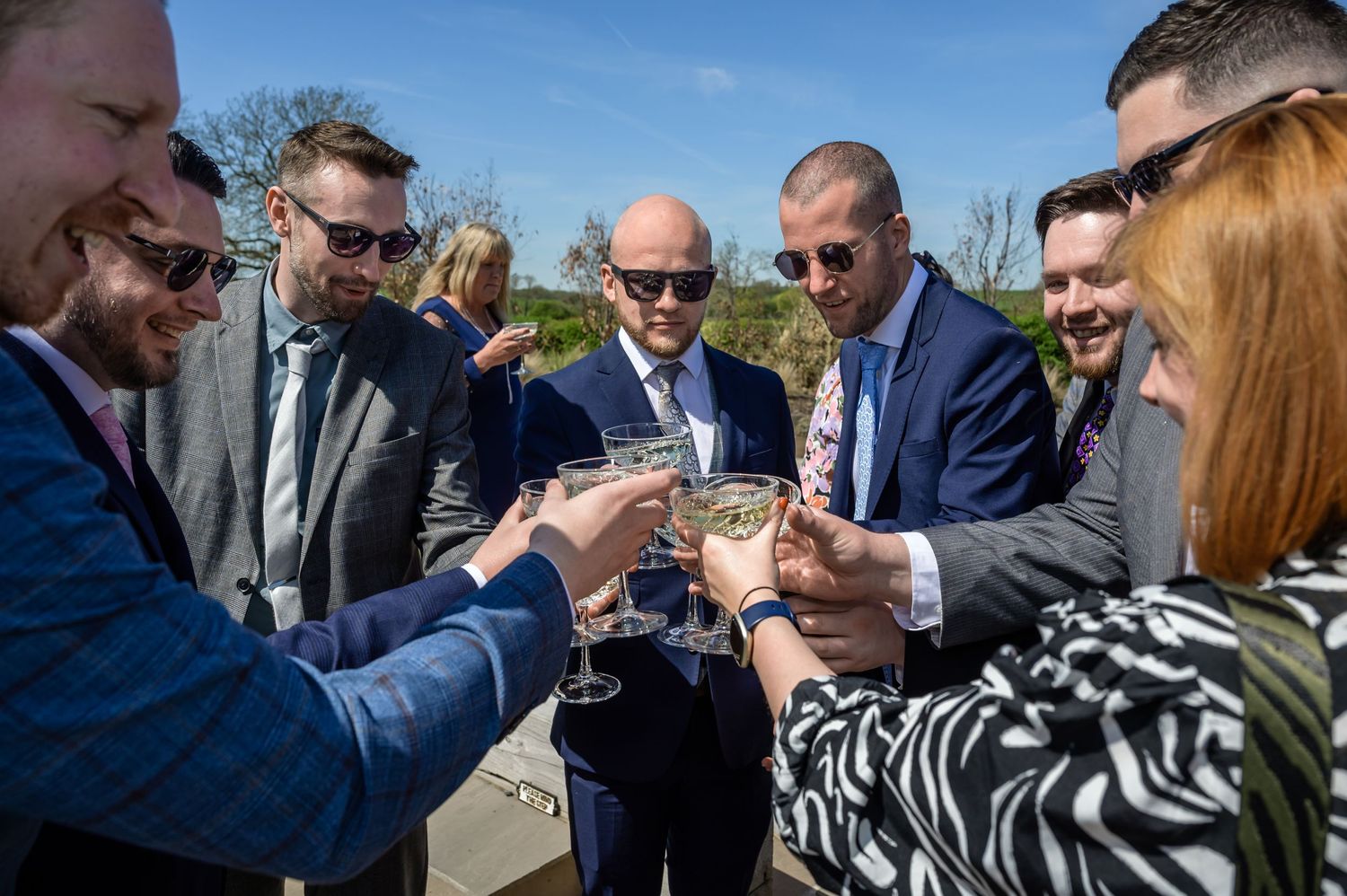 Guests enjoy a drink after ceremony at Eden Barn wedding