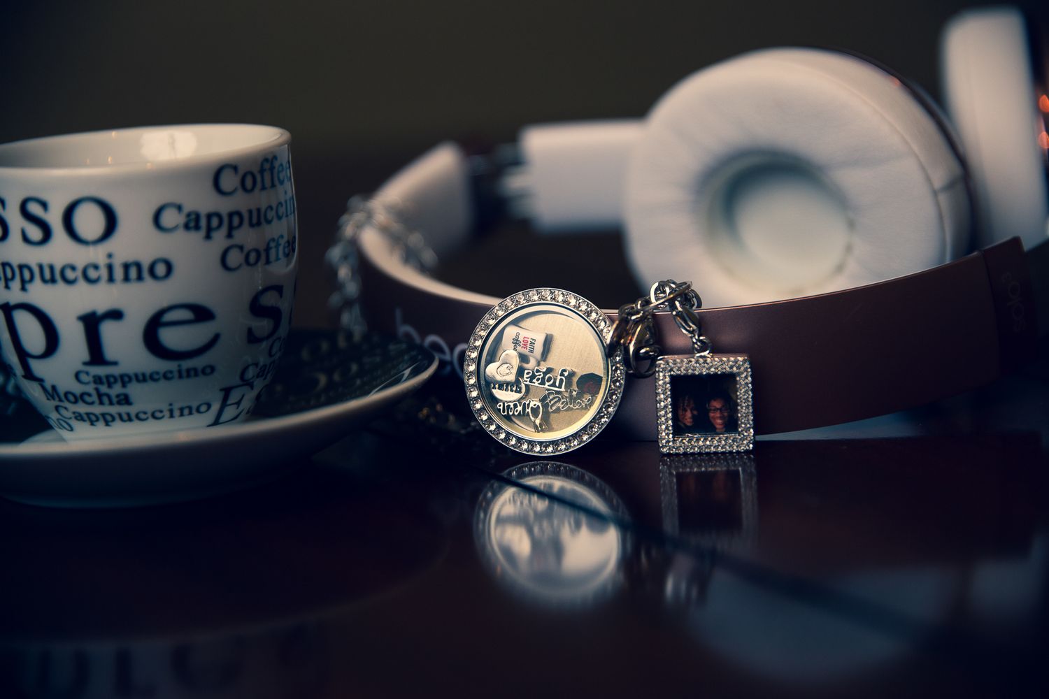 Artistic coffee cup photography with shallow depth of field and moody lighting.