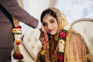Bride giving Salam to her husband on her wedding day