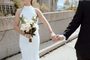 Bride and Groom holding hands