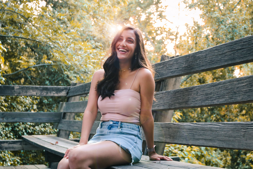 Portrait photo of a girl on a bench in Fresno, California