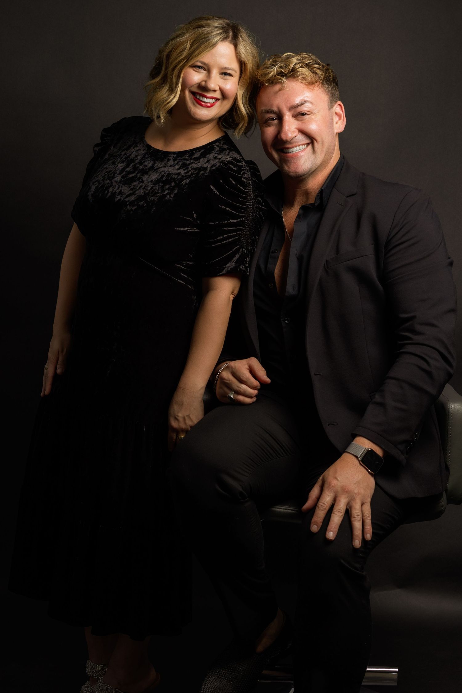 An in studio professional image of the founders of GLAS Savannah, a full service wedding elopement business.
