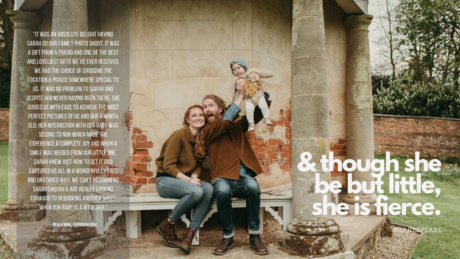 Mum and dad hold baby high in the air while sitting on a wooden bench by a historical building or structure with columns