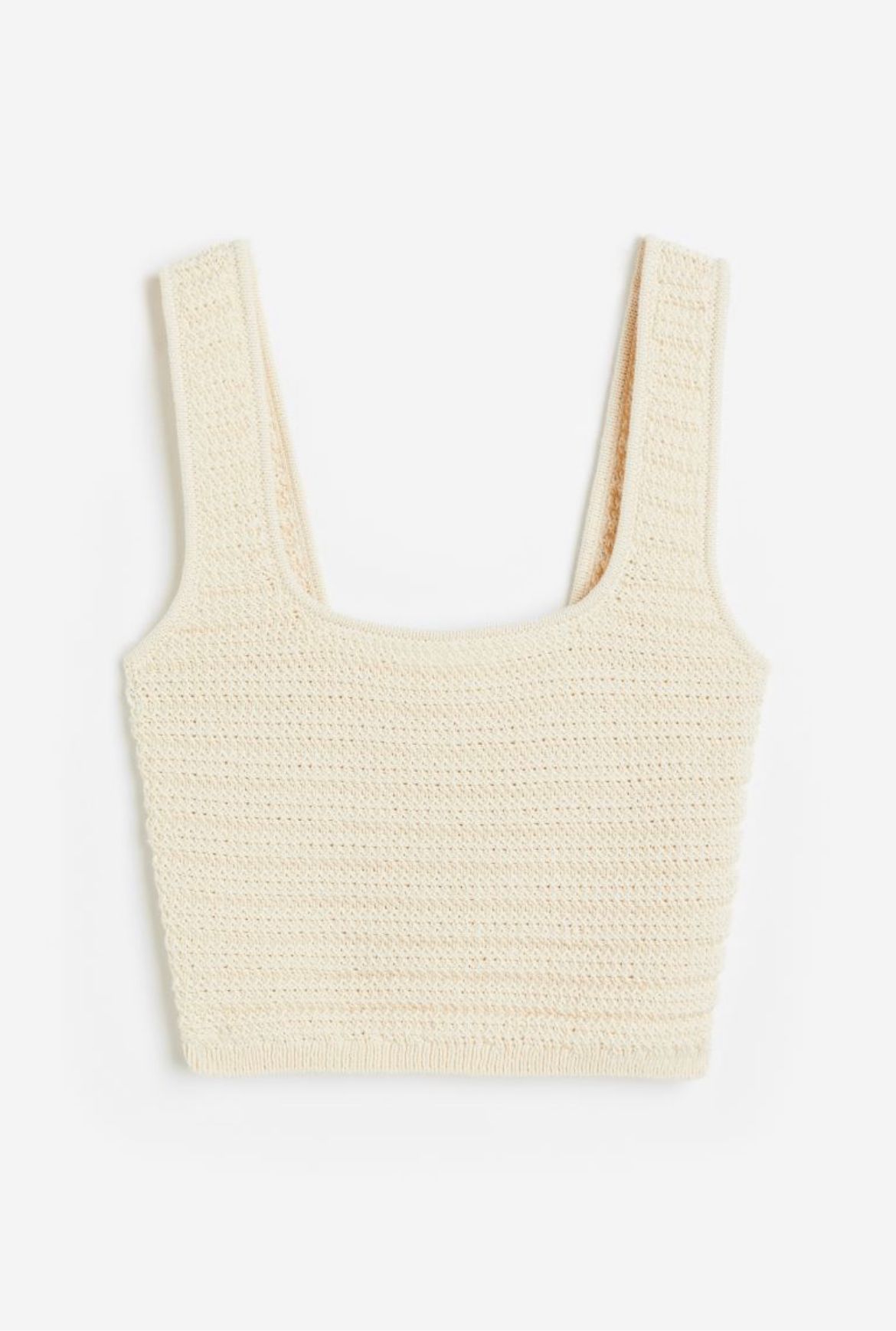 Cremefarvet strikket crop top med brede skulderstropper og tekstureret mønster.