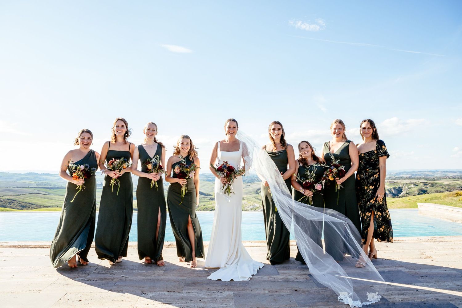 Group photography of the bride and bridesmaids at The Lazy Olive, Podere Finerri, Asciano, Siena.