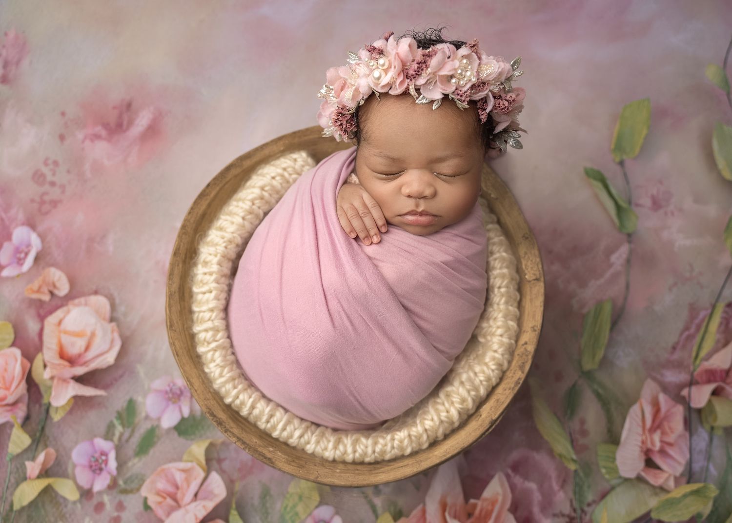 Newborn baby girl in a bowl with floral halo. Monica Bliss Photography in Chapel Hill, NC. Newborn, Maternity, portrait.