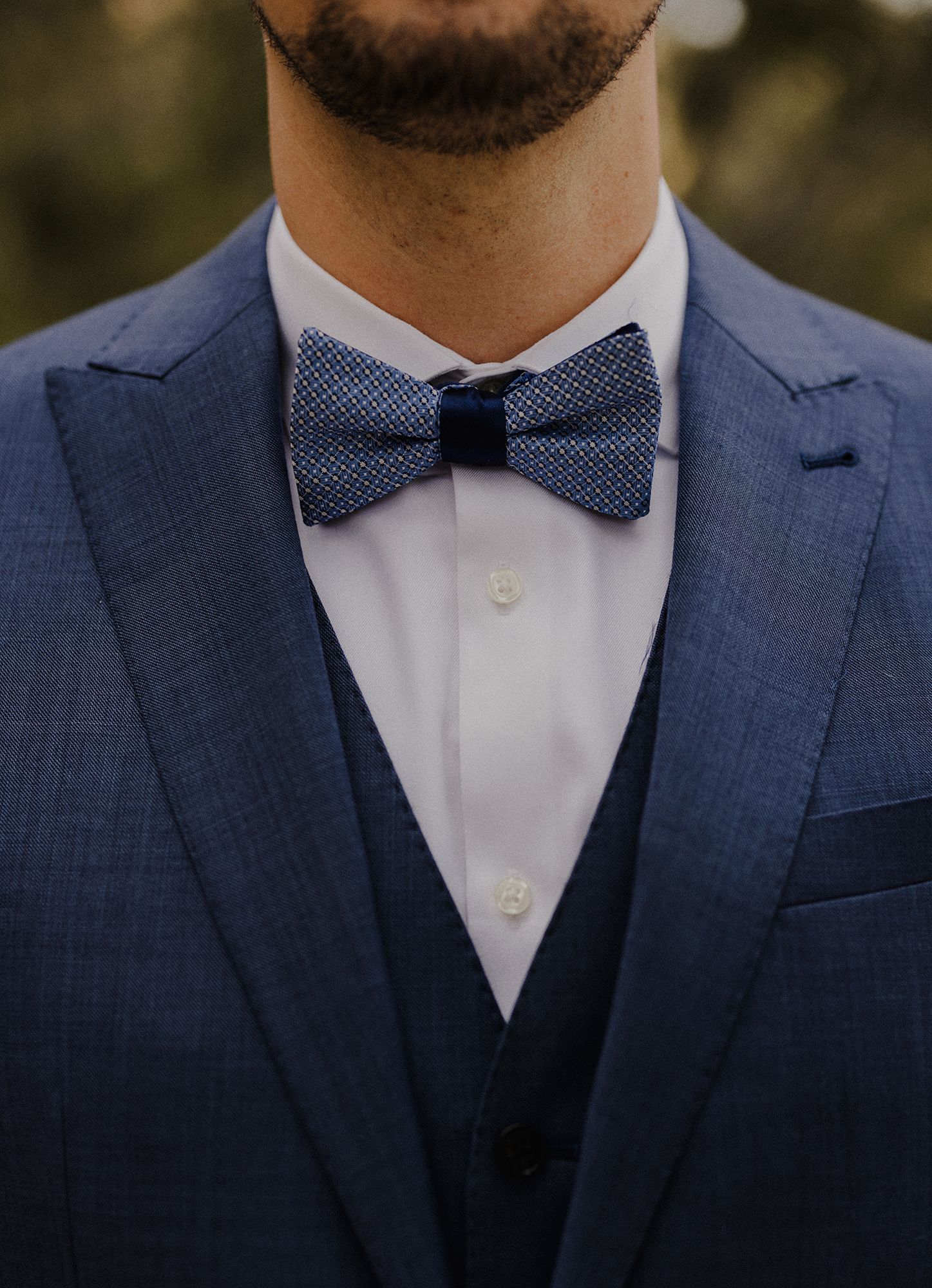 E Noelle Photography in-home wedding in Hidden Hills Los Angeles, groom candid getting ready bowtie