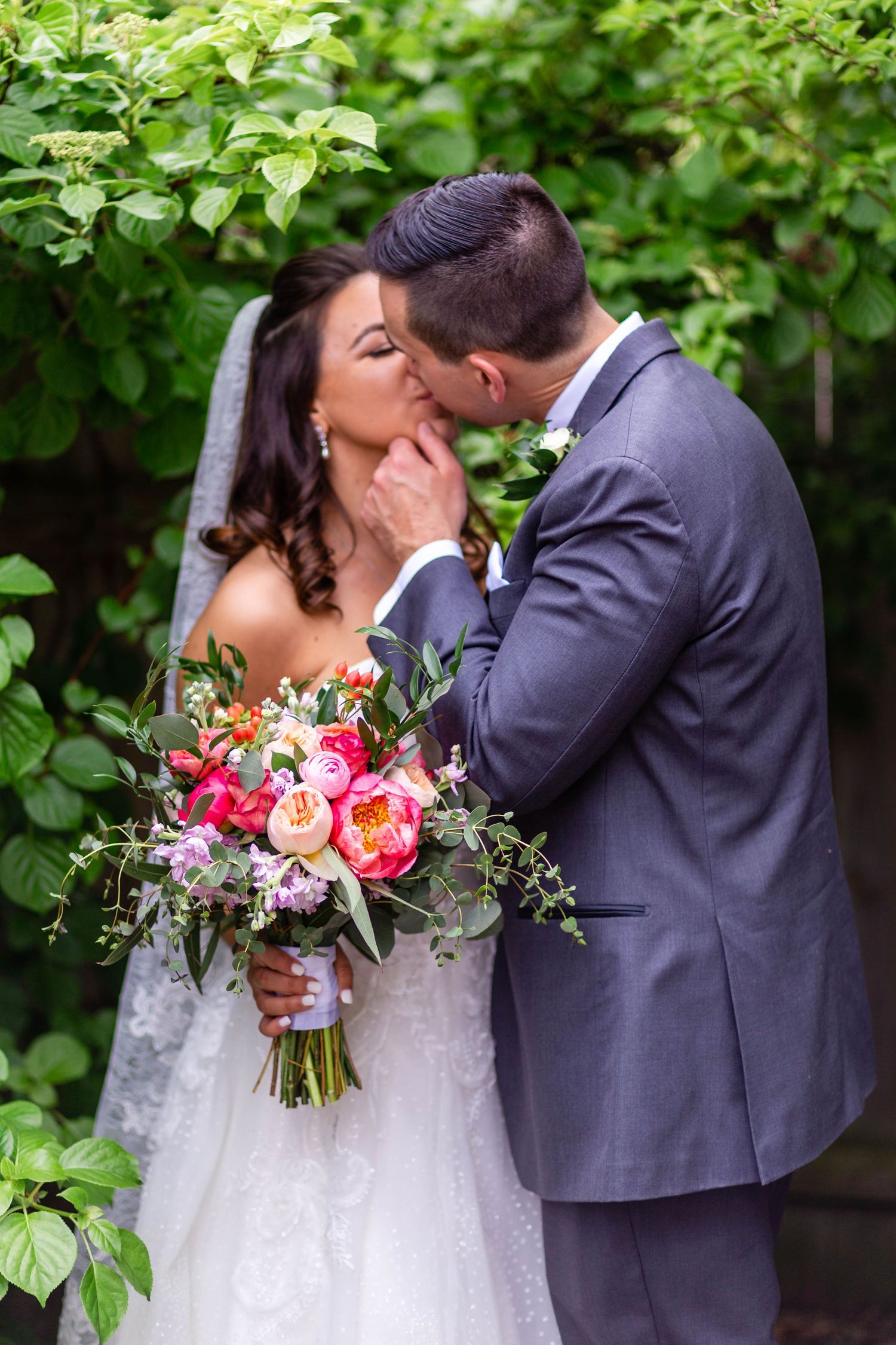 bride and groom kissing